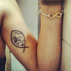 Fish-Doodle-Tattoo-Design-On-Arm